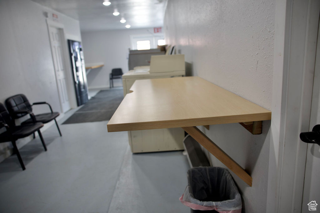Dining room featuring finished concrete floors