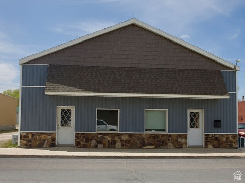 Exterior space with stone siding