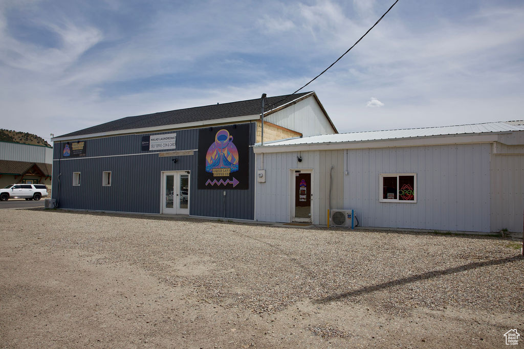View of building exterior with ac unit