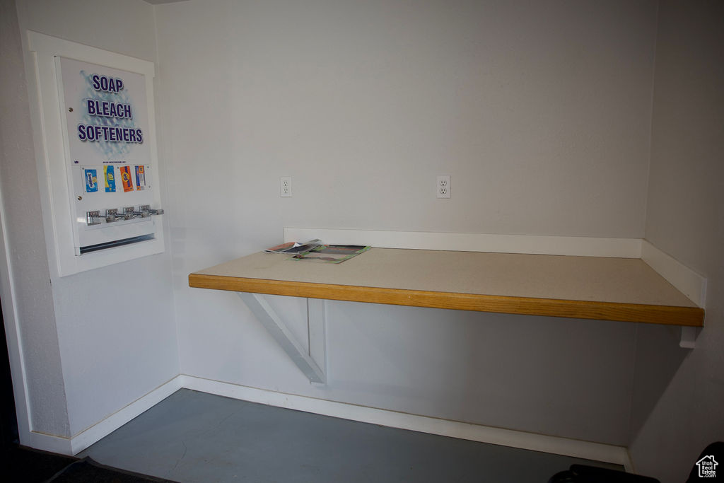 Unfurnished dining area with baseboards