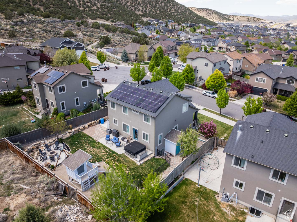 Drone / aerial view featuring a mountain view and a residential view