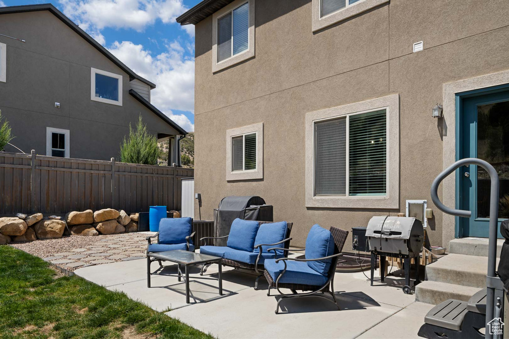 View of patio / terrace featuring fence