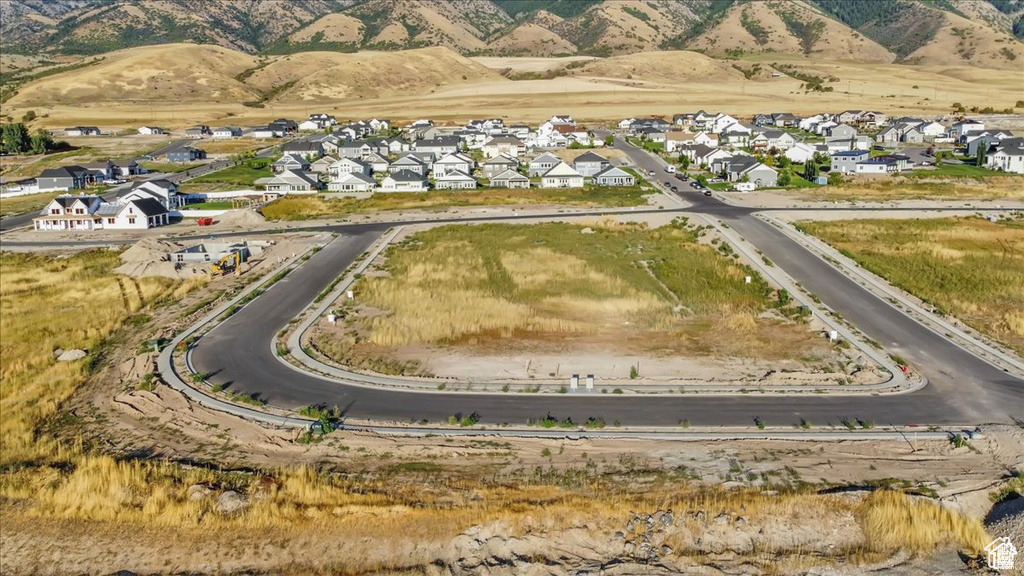 Aerial view featuring a mountain view and a residential view