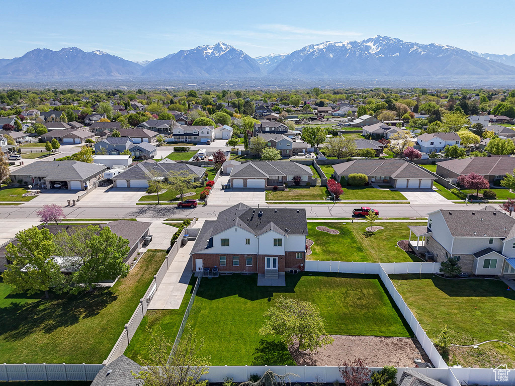 Drone / aerial view featuring a mountain view and a residential view