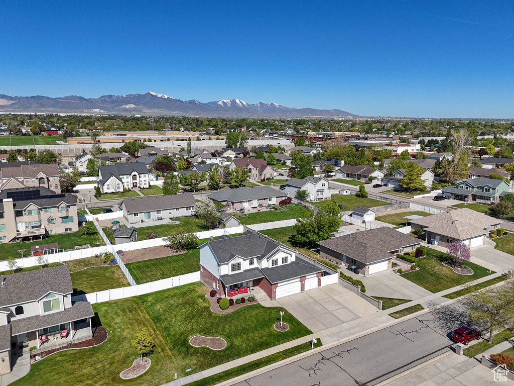Drone / aerial view with a mountain view and a residential view