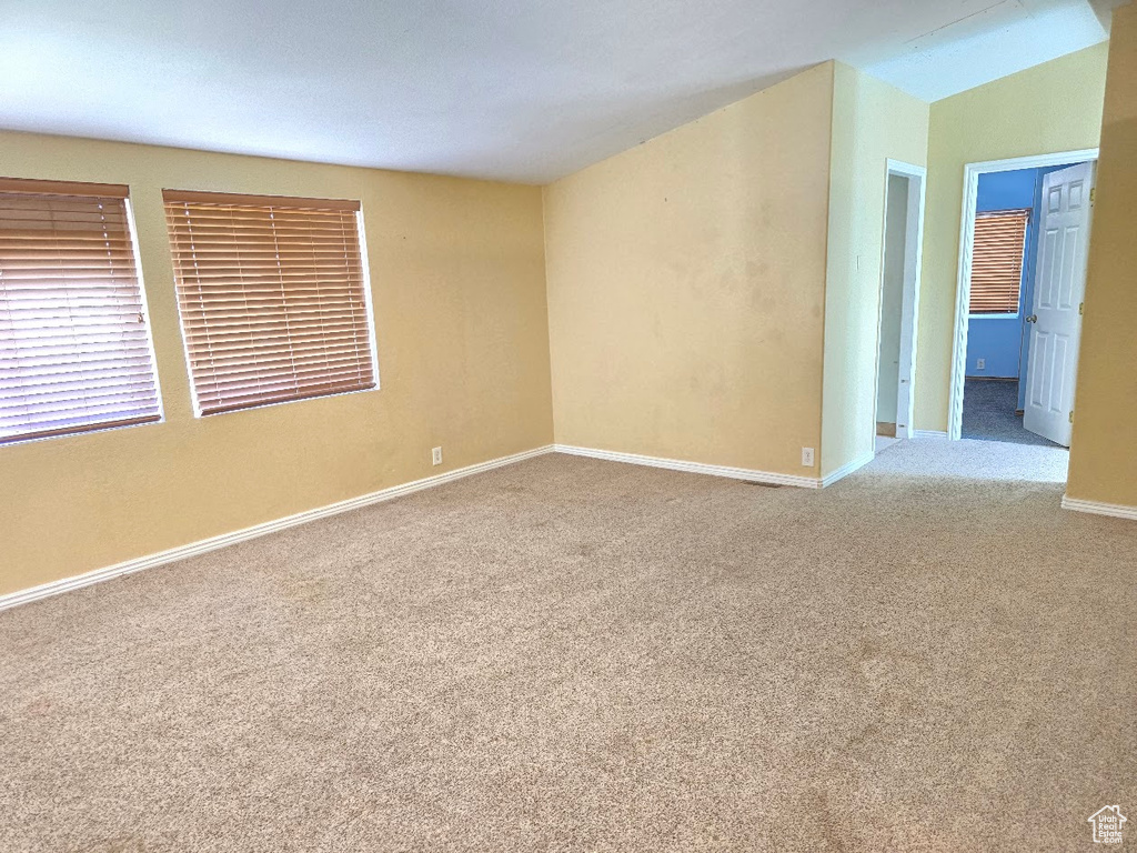 Spare room with carpet flooring and baseboards
