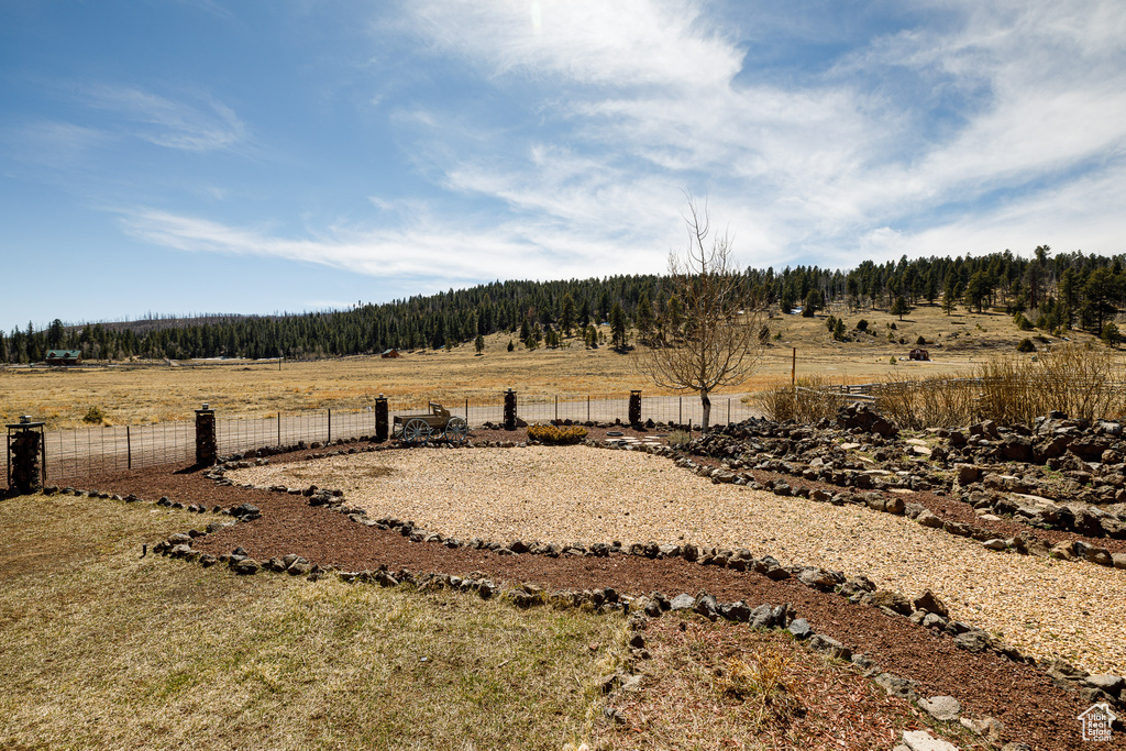 View of yard featuring fence