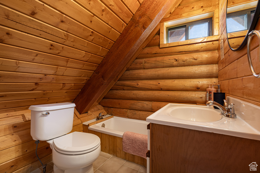 Full bath with toilet, rustic walls, a washtub, and vanity