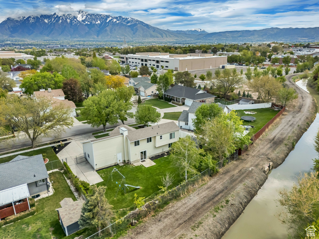 Drone / aerial view featuring a residential view and a mountain view