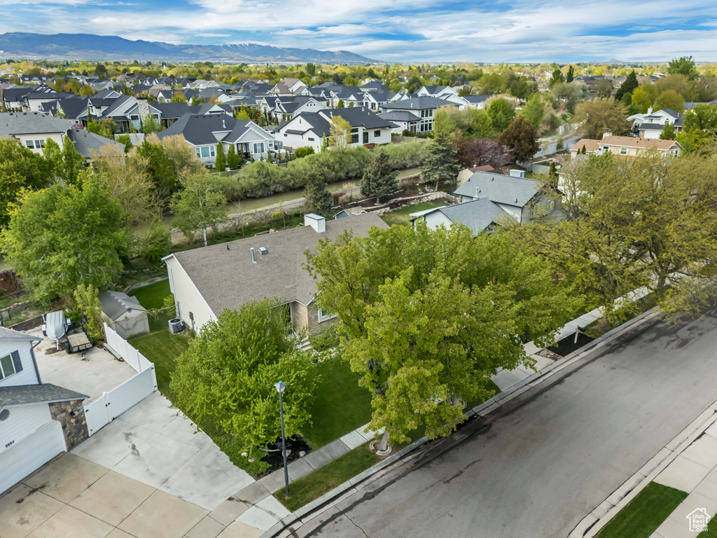 Birds eye view of property featuring a mountain view and a residential view
