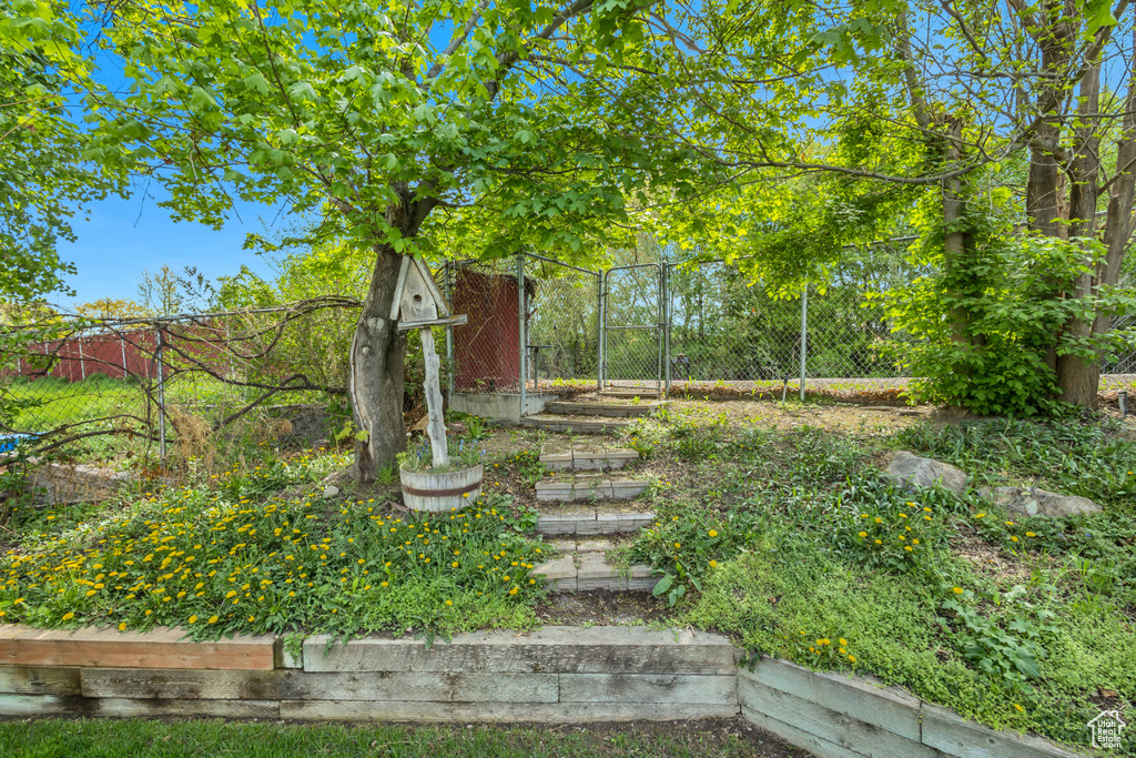 View of yard with fence
