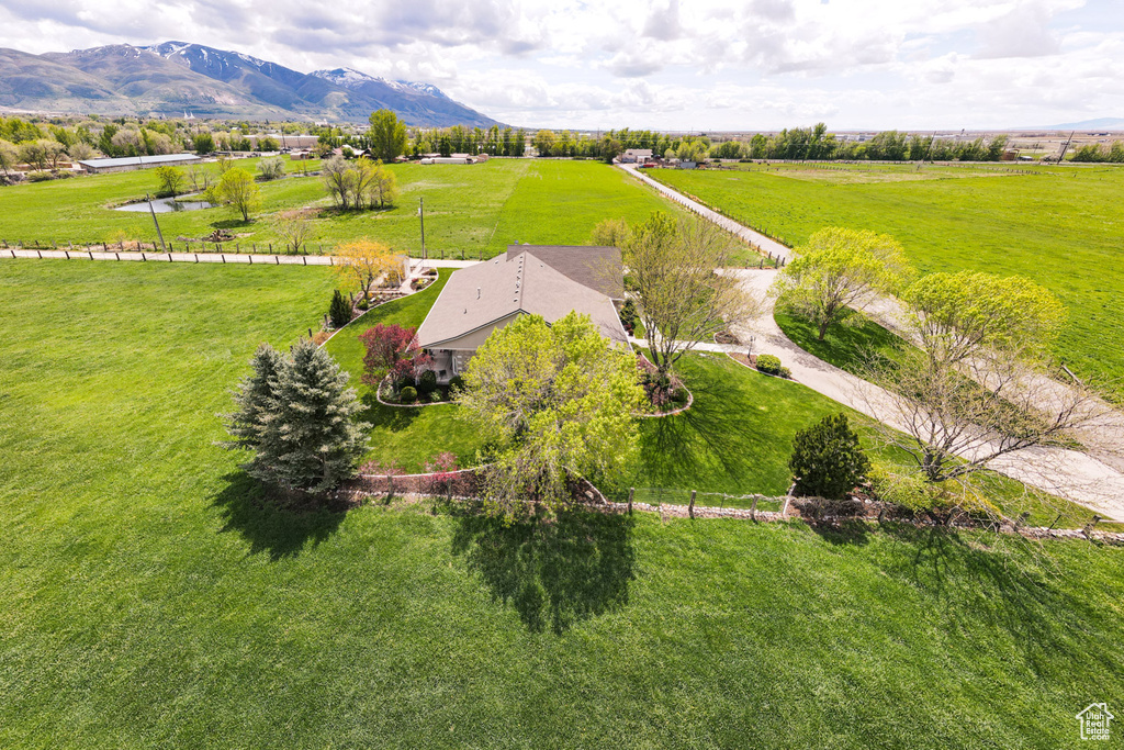 Drone / aerial view with a mountain view and a rural view