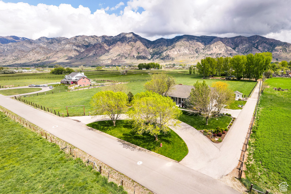 Property view of mountains with a rural view