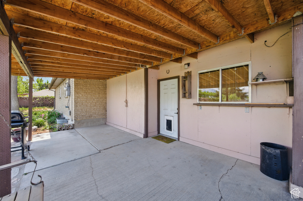 View of patio featuring a grill