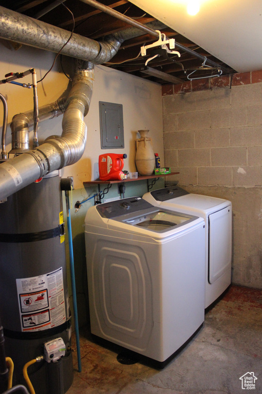 Laundry area with secured water heater, laundry area, washer and clothes dryer, and electric panel