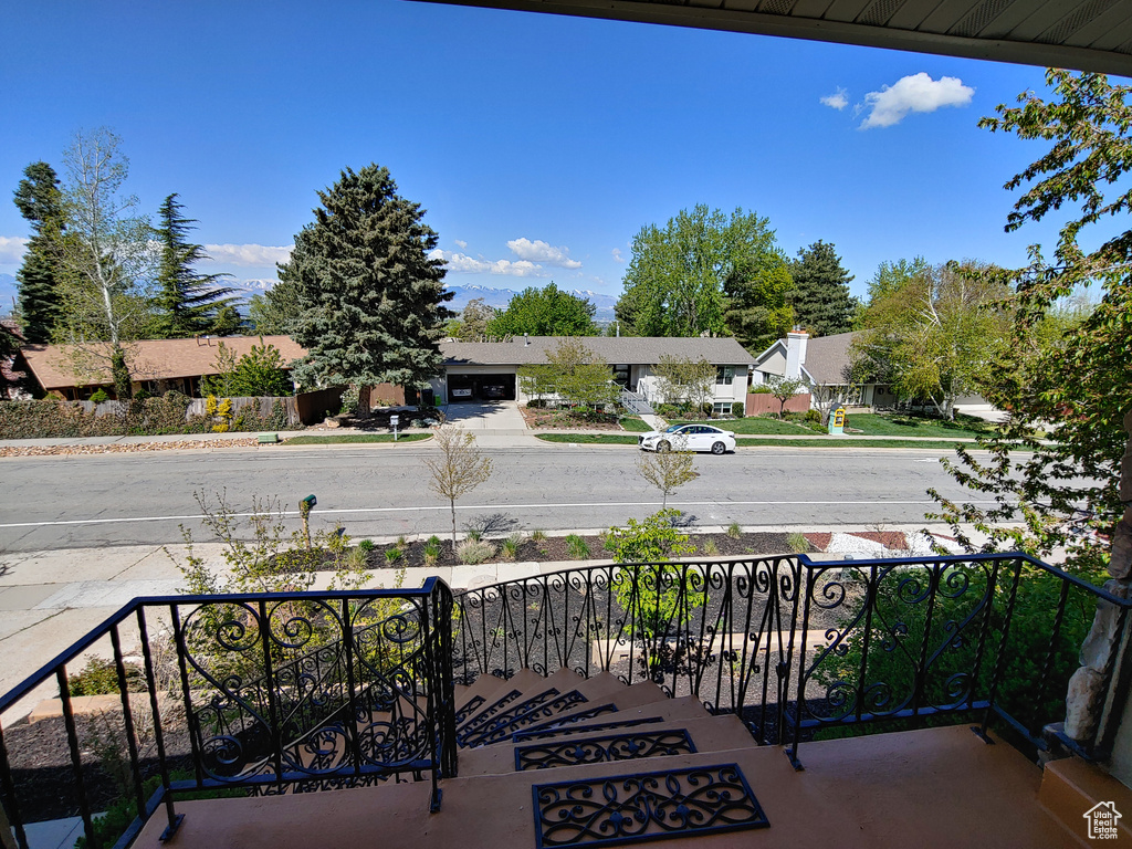 Balcony featuring a residential view