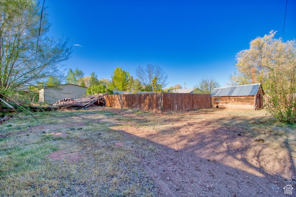 View of yard with fence