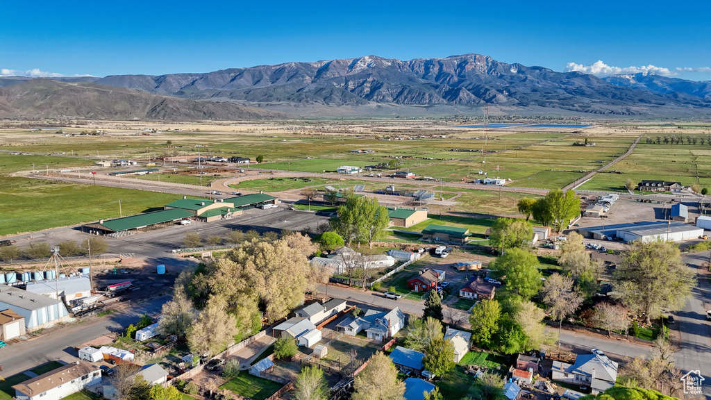 Drone / aerial view with a mountain view and a rural view