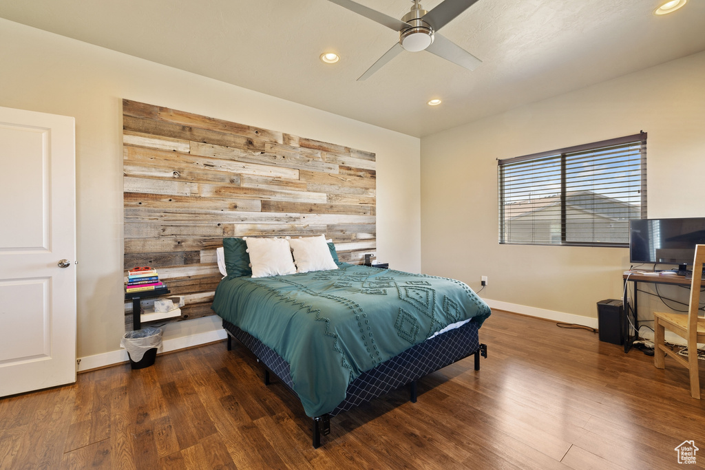 Bedroom with recessed lighting, baseboards, ceiling fan, and wood finished floors