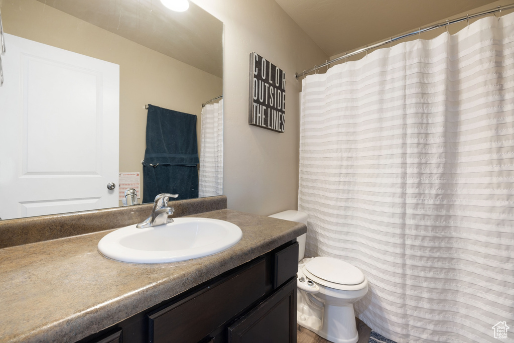 Bathroom with vanity and toilet