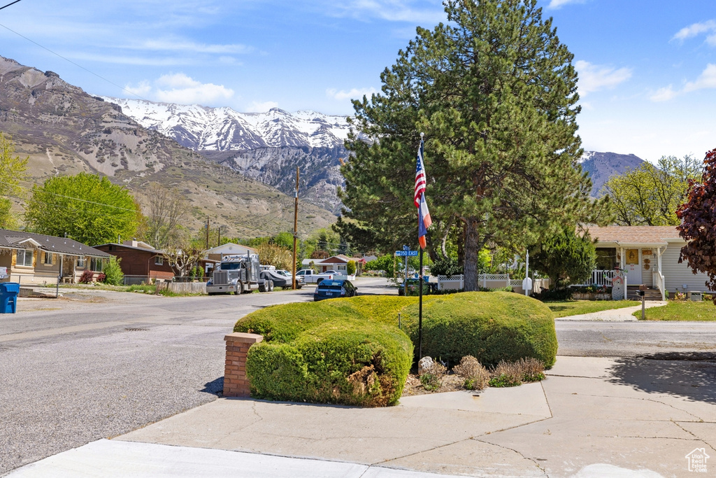 View of road featuring a mountain view and a residential view