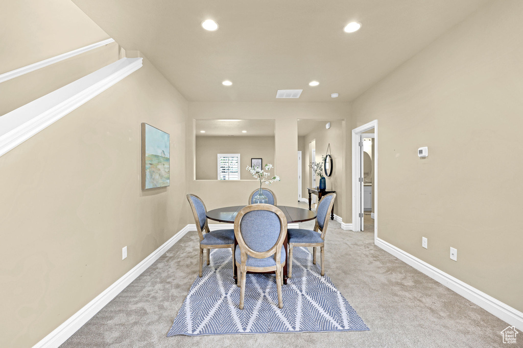 Dining space featuring carpet floors, recessed lighting, baseboards, and visible vents