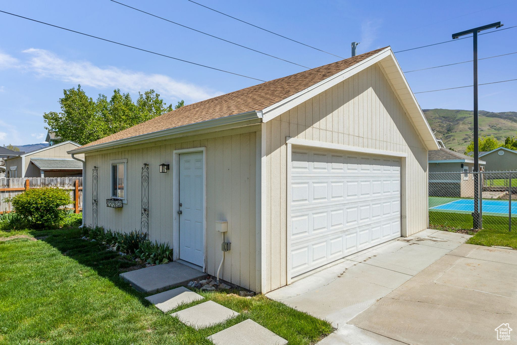 Detached garage with fence