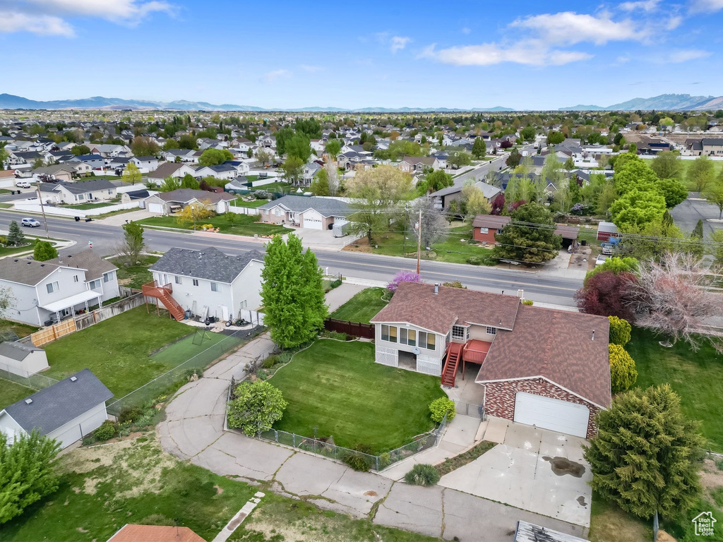 Aerial view featuring a mountain view and a residential view