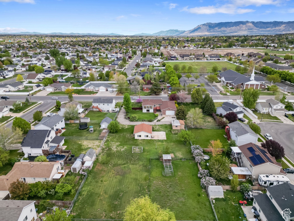 Drone / aerial view with a mountain view and a residential view
