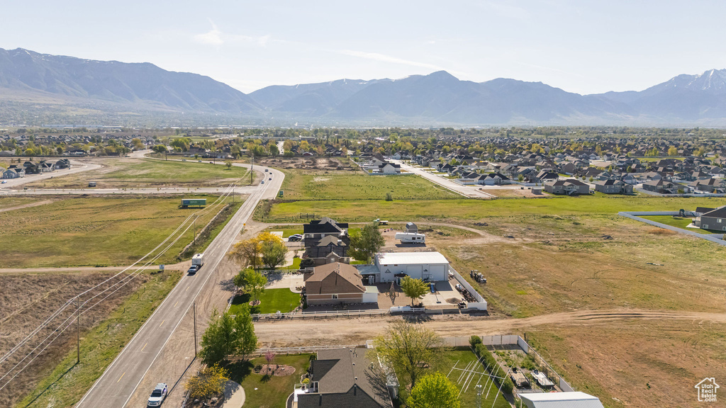 Drone / aerial view featuring a residential view and a mountain view