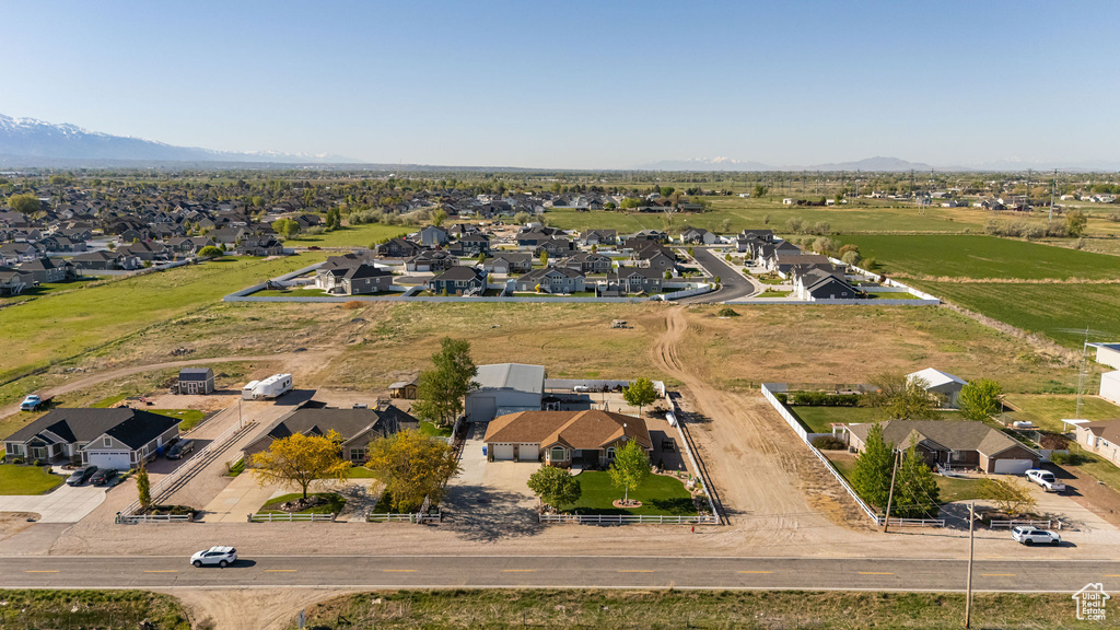 Drone / aerial view featuring a mountain view and a residential view
