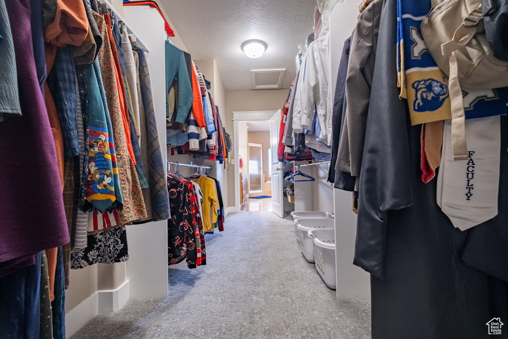 Walk in closet with attic access