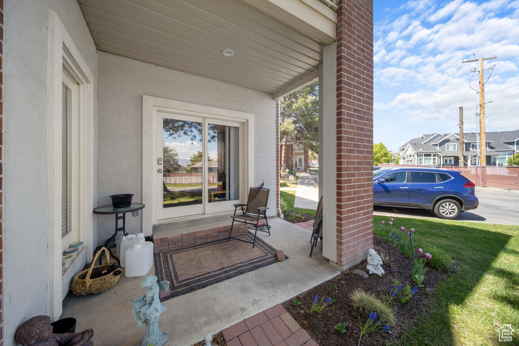 View of patio featuring covered porch and a residential view
