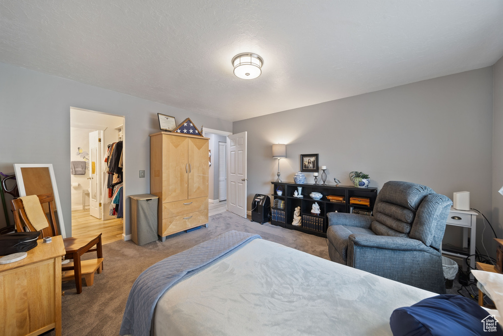 Bedroom with carpet flooring