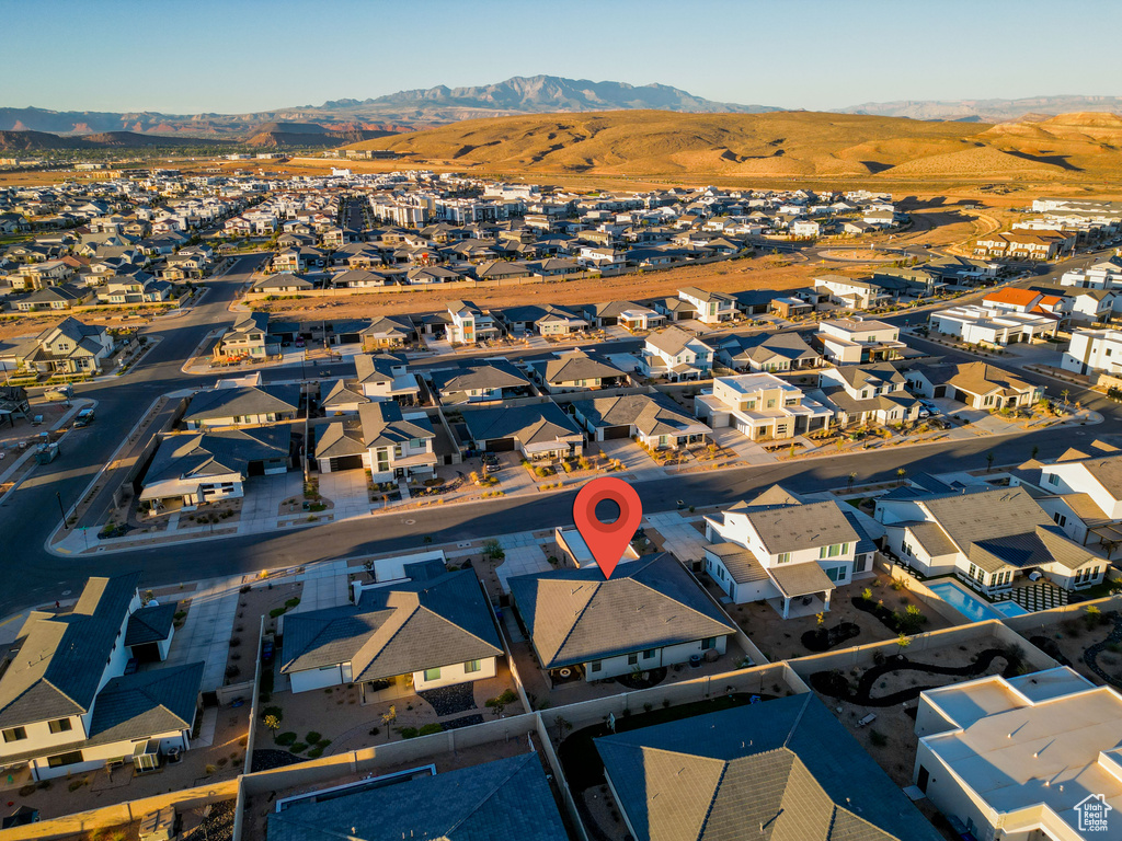 Drone / aerial view with a residential view and a mountain view