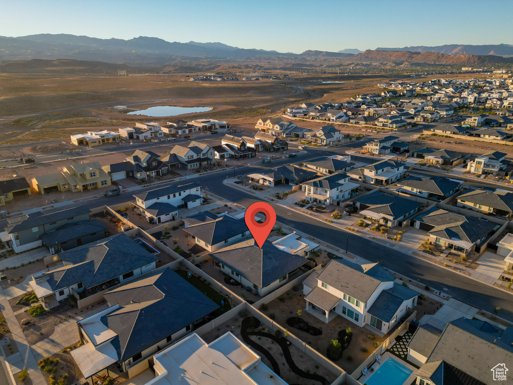 Drone / aerial view with a residential view and a mountain view