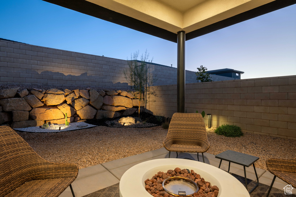 View of patio / terrace featuring a fire pit and a fenced backyard