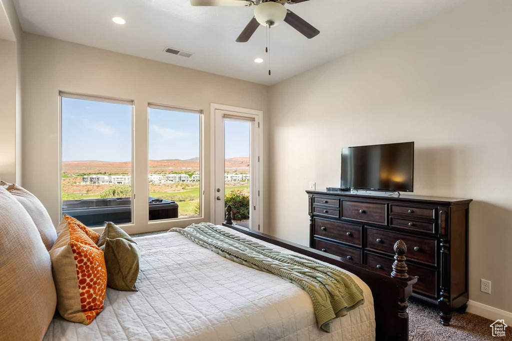 Carpeted bedroom with baseboards, access to exterior, recessed lighting, and visible vents