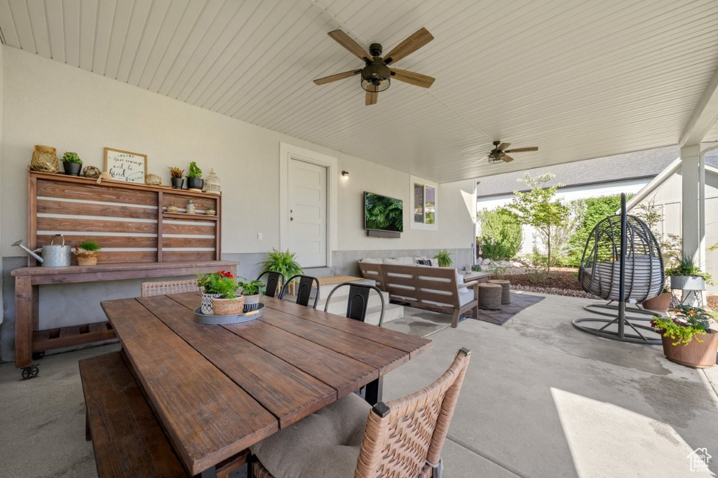 Exterior space with ceiling fan, an outdoor living space, and outdoor dining area