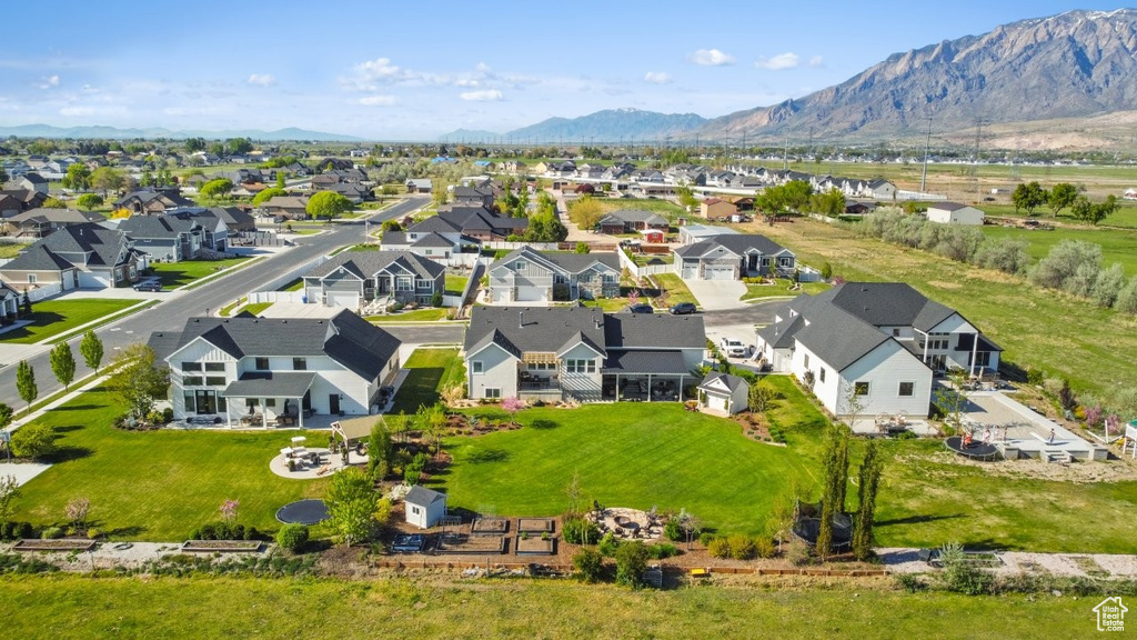 Drone / aerial view with a residential view and a mountain view