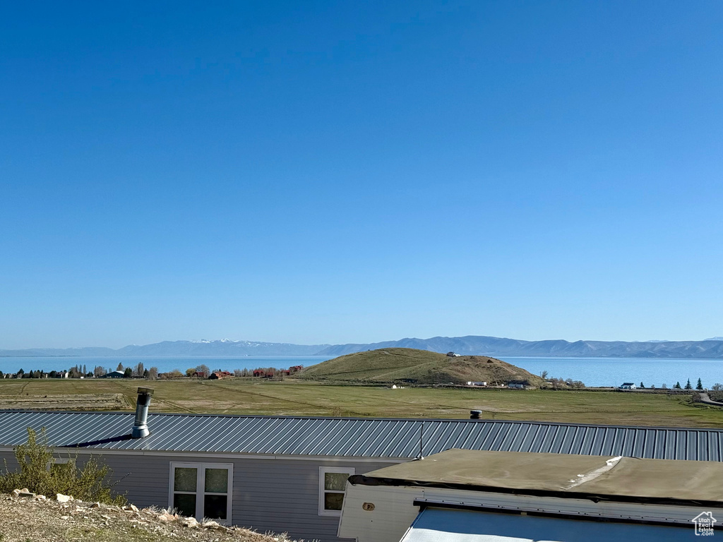 Exterior space with a water view