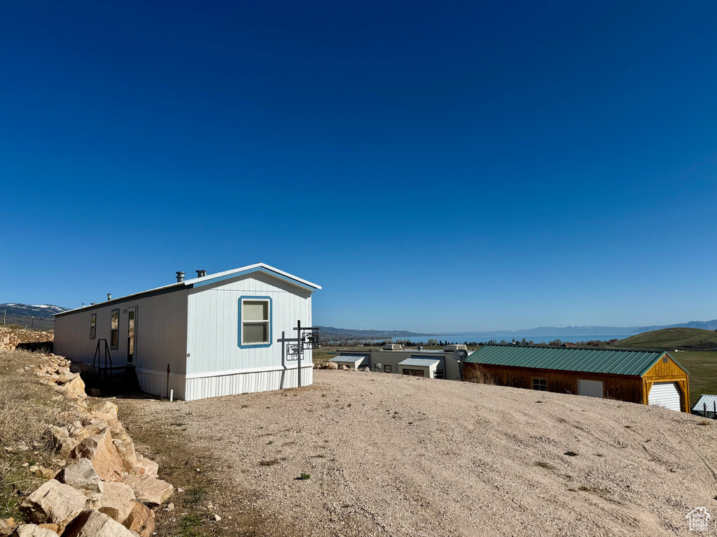 Exterior space featuring a mountain view