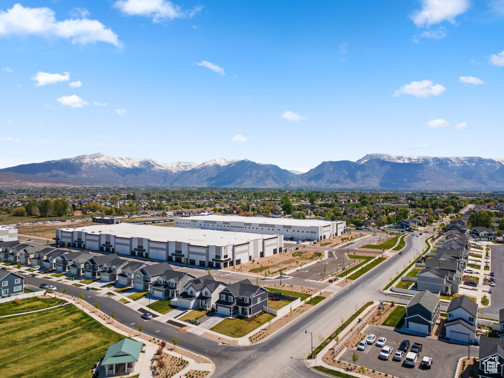 Drone / aerial view featuring a mountain view and a residential view