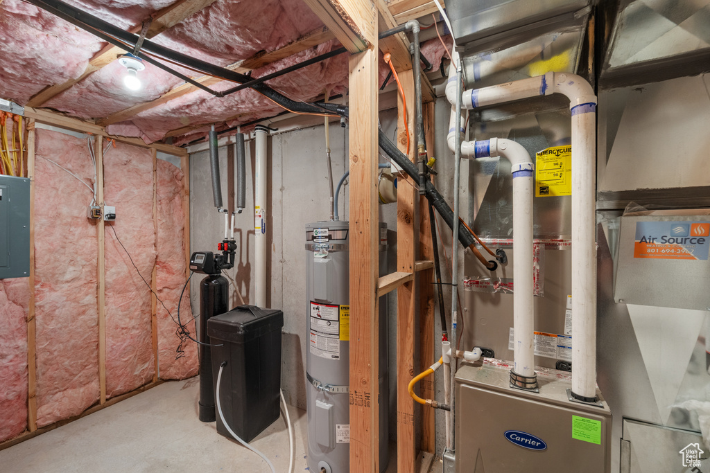Utilities featuring strapped water heater and electric panel