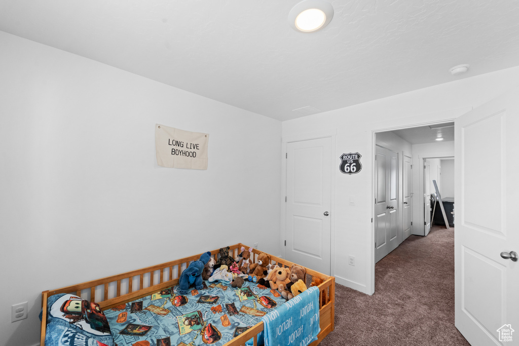 View of carpeted bedroom
