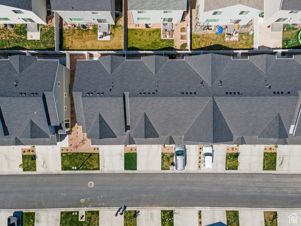 Birds eye view of property with a residential view