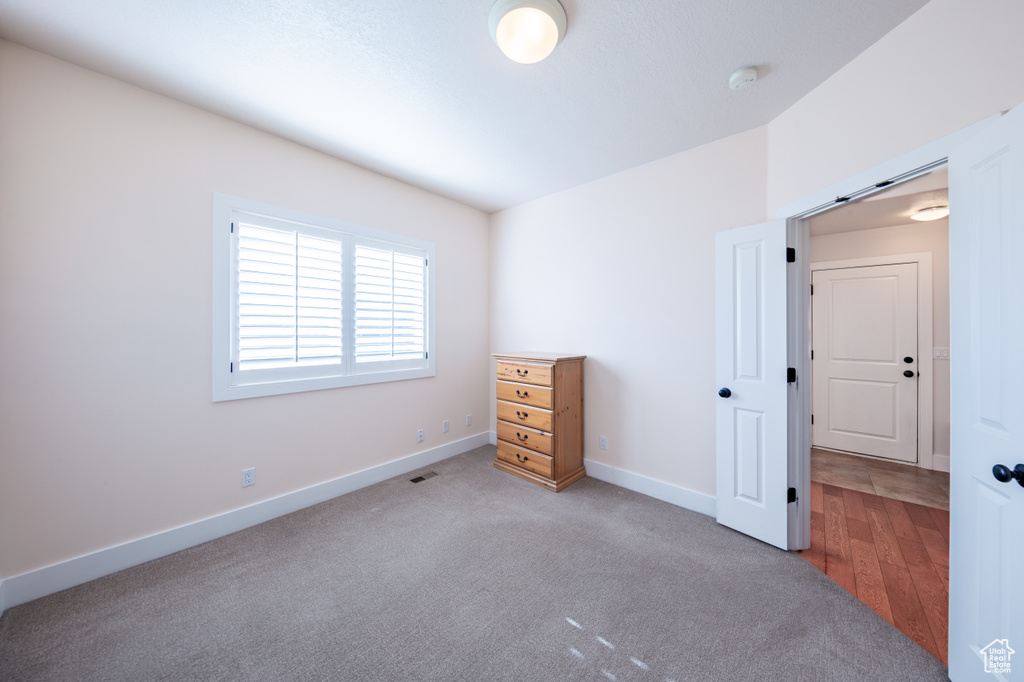Unfurnished bedroom featuring baseboards and visible vents