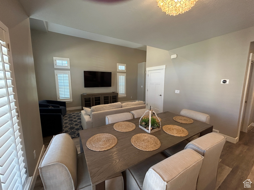 Dining area featuring baseboards and wood finished floors