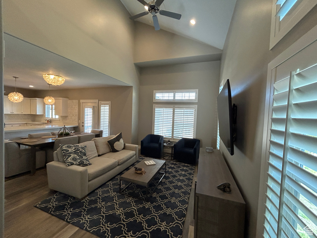 Living room with a ceiling fan, recessed lighting, wood finished floors, and a wealth of natural light