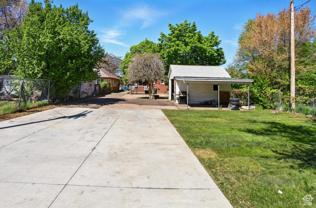 Exterior space with concrete driveway